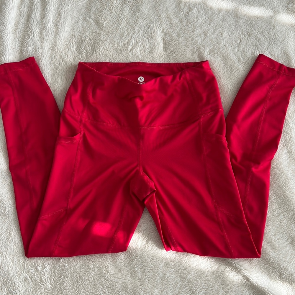 Red leggings with side pockets